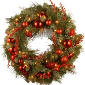 24 Inches Pre-Lit Artificial Christmas Wreath, Green, Evergreen, White Lights, Decorated with Ball Ornaments, Red Sprigs